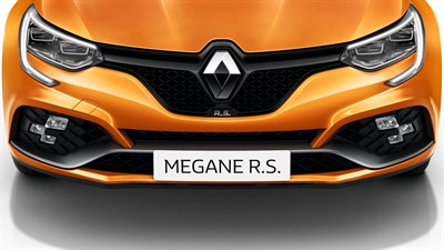 Renault branding shown in the front view of the orange-colored Renault Megane R.S.