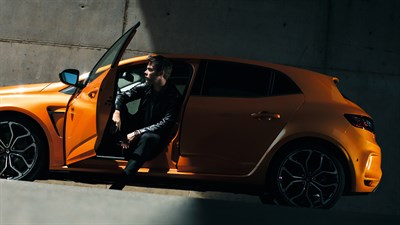 Man getting out of his Renault Megane R.S. 