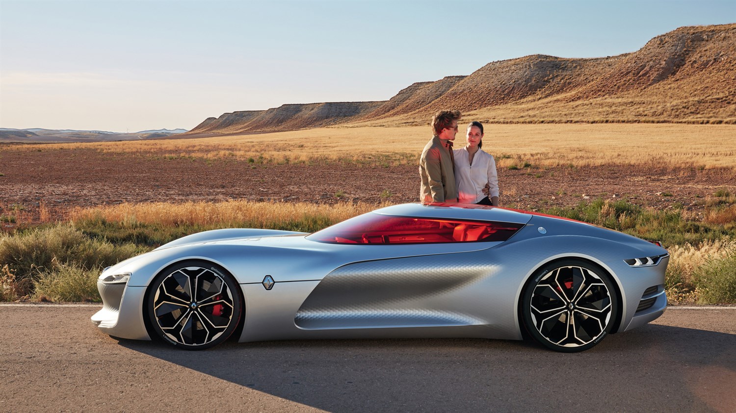 Couple Standing Next To Renault TREZOR Concept Car