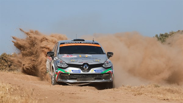 Renault Sport car driving on the sand dune