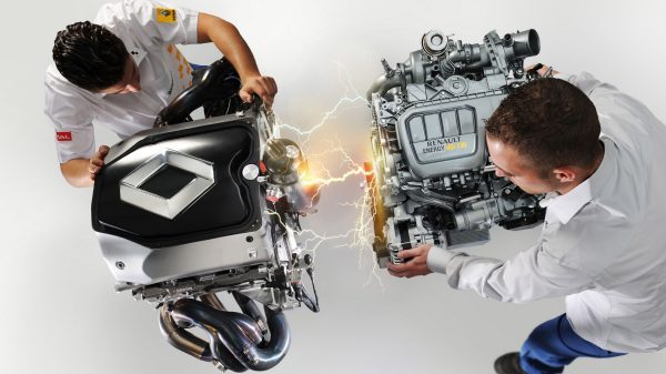 Two experts working on the Renault F1 engine
