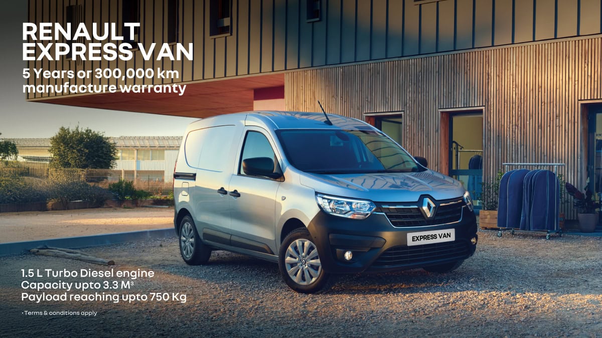 A Renault Express van parked at a workshop