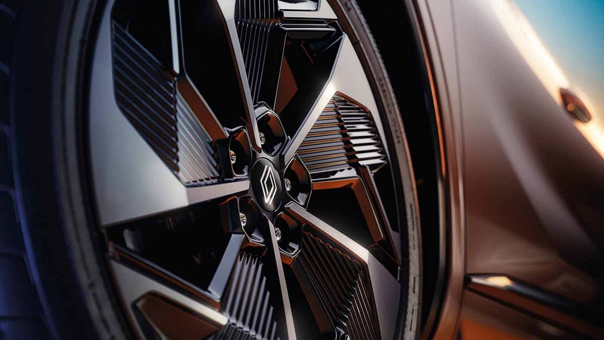 A side view of the wine-colored New Renault KOLEOS running towards the shade of a building